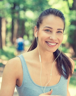 girl running headphones
