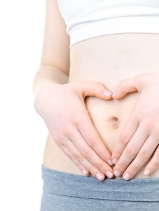 woman holding stomach