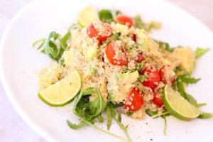 Quinoa salad with tomatoes and limes